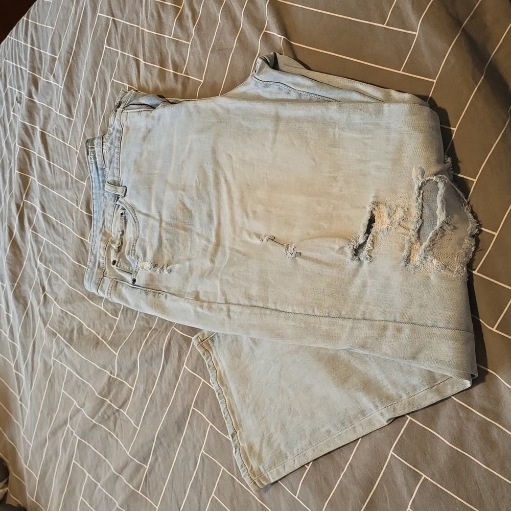 Women's acid wash distressed jeans